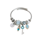 Silver bracelet with various charms on a white background