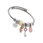 Silver bracelet with various charms on a white background