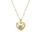 Gold heart-shaped necklace with a pink gemstone on a white background