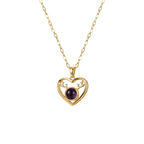 Gold heart-shaped necklace with a purple gemstone on a white background