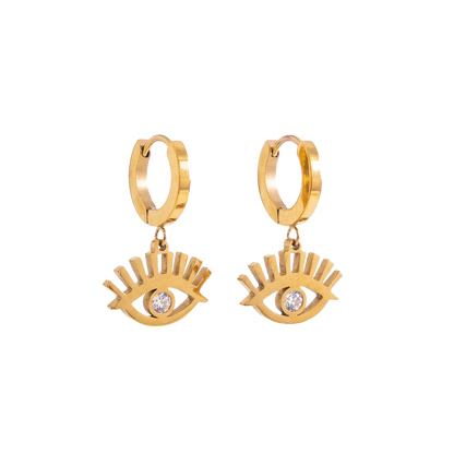 Gold hoop earrings with eye designs on a white background