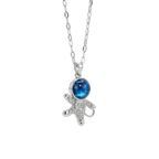 Starfish-shaped pendant with a blue gemstone on a white background