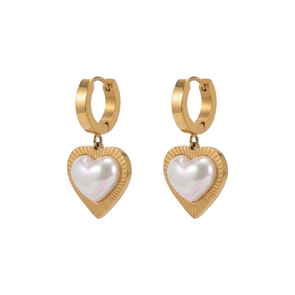 Gold hoop earrings with heart-shaped pearl drops on a white background