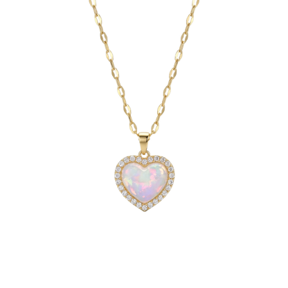 Heart-shaped opal pendant on a gold chain against a white background