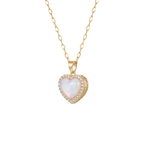 Gold necklace with a heart-shaped pendant on a white background