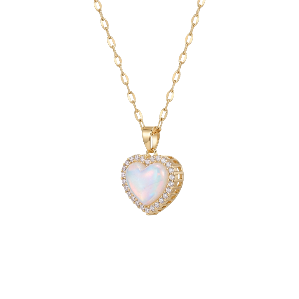 Gold necklace with a heart-shaped pendant on a white background