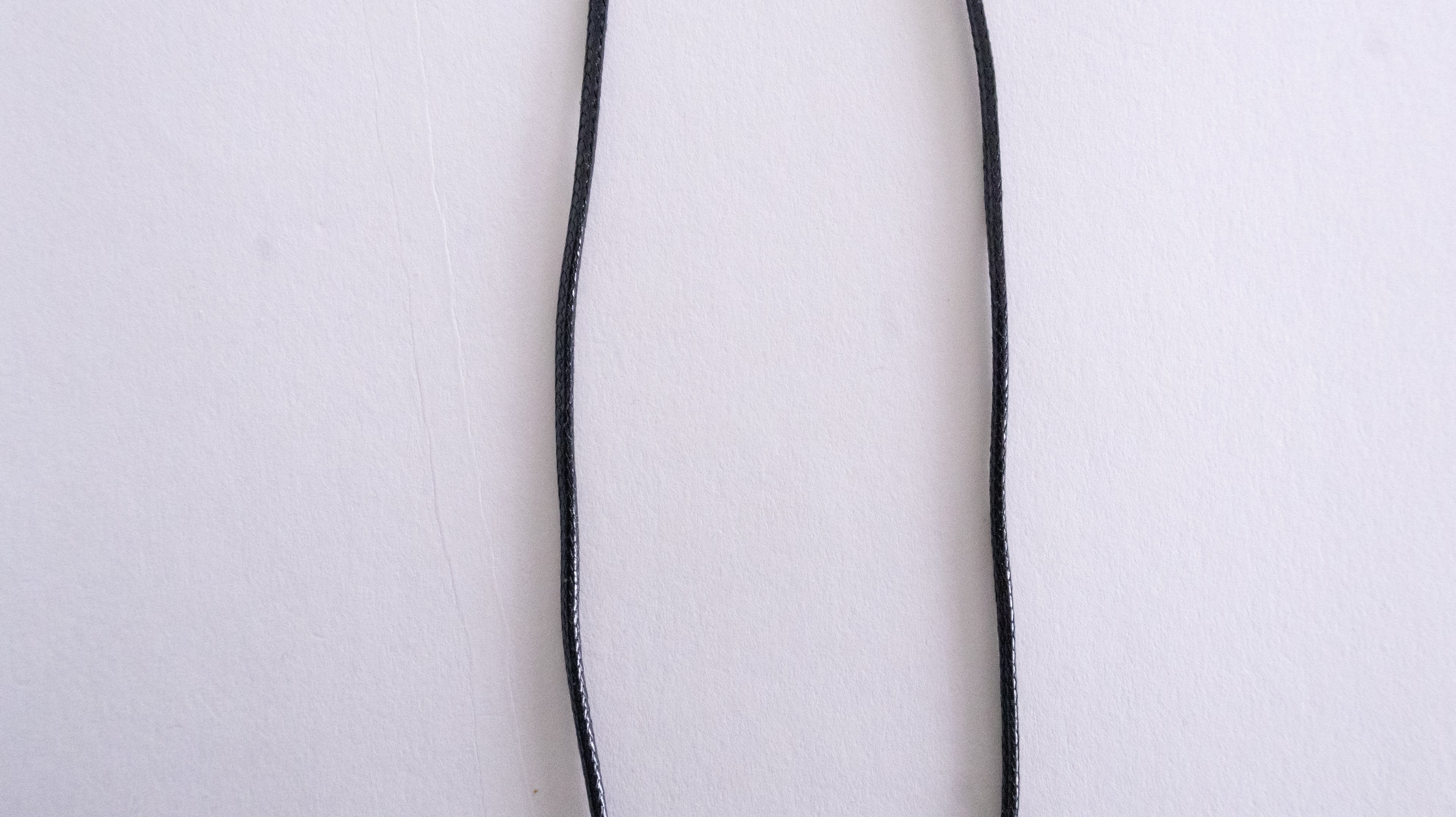 Thin black line on a white background