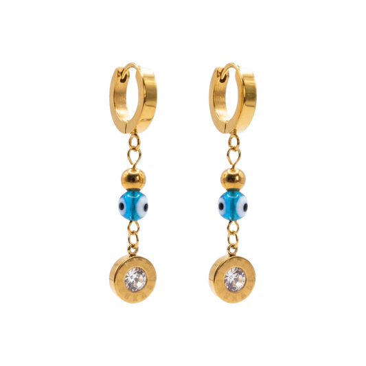 Gold hoop earrings with blue beads and clear stones on a white background