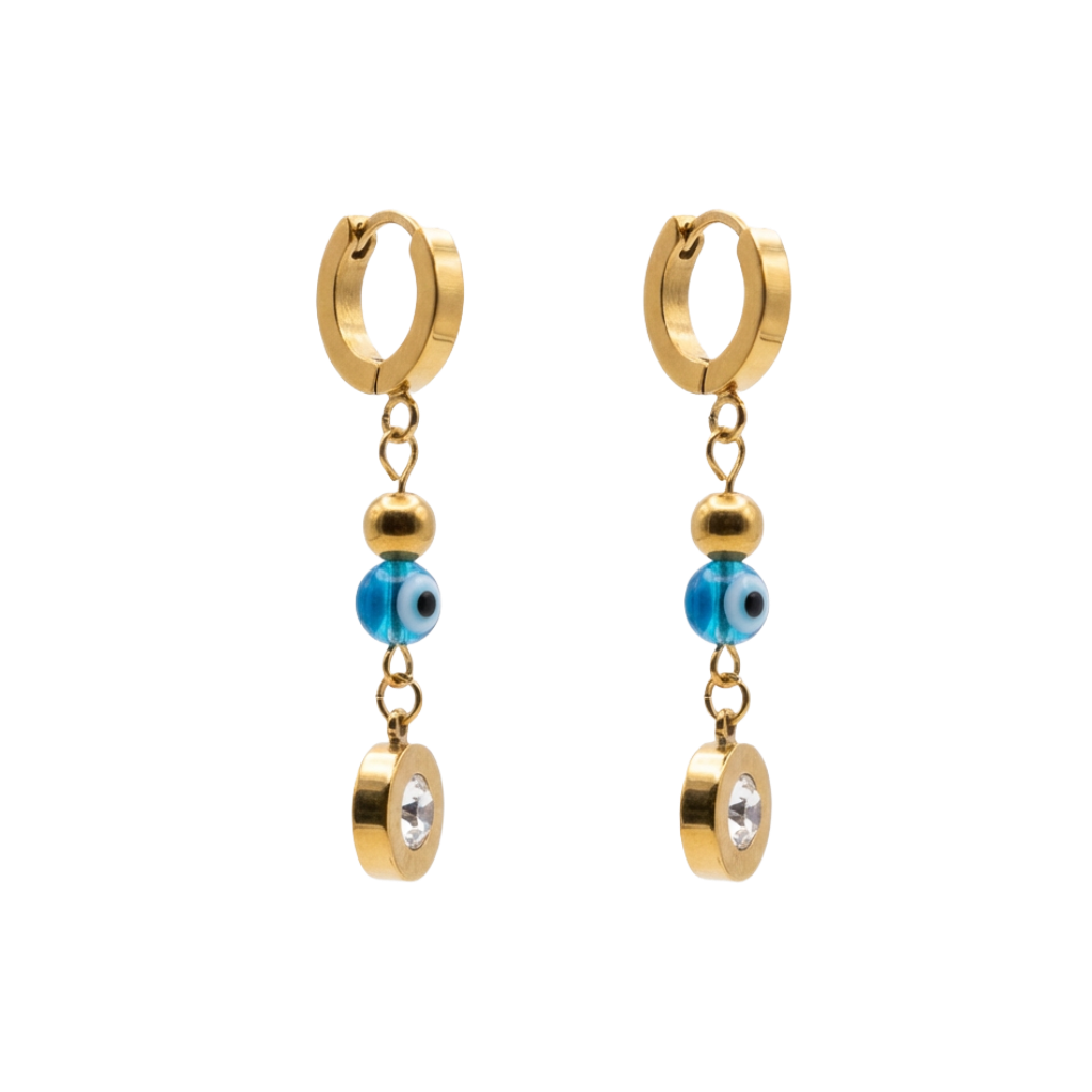 Gold hoop earrings with blue evil eye beads and clear stones on a white background