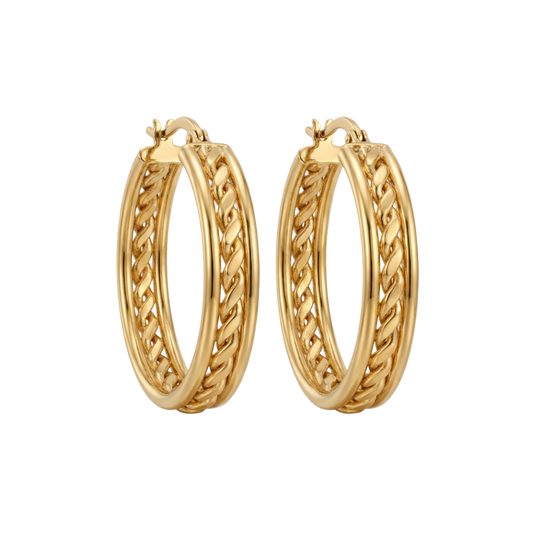 Gold hoop earrings on a white background