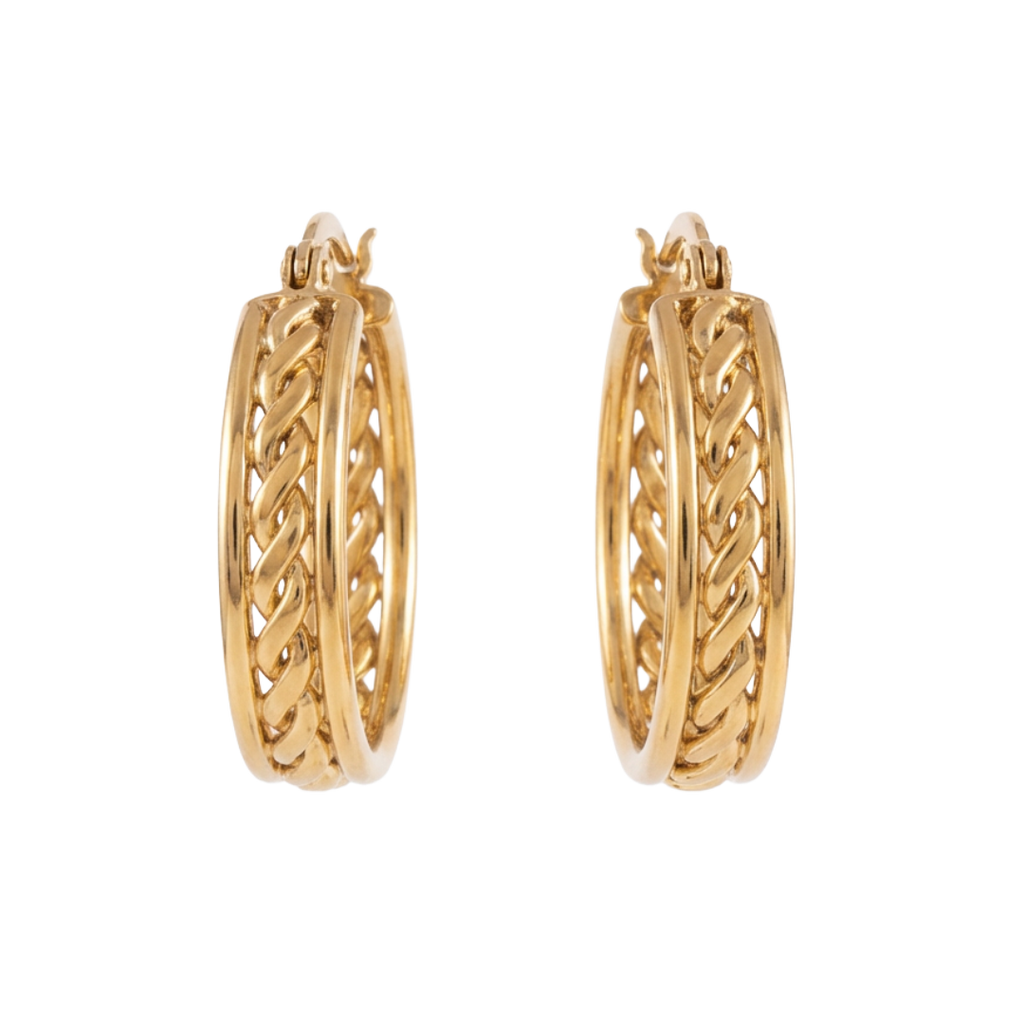 Gold hoop earrings with intricate design on a white background