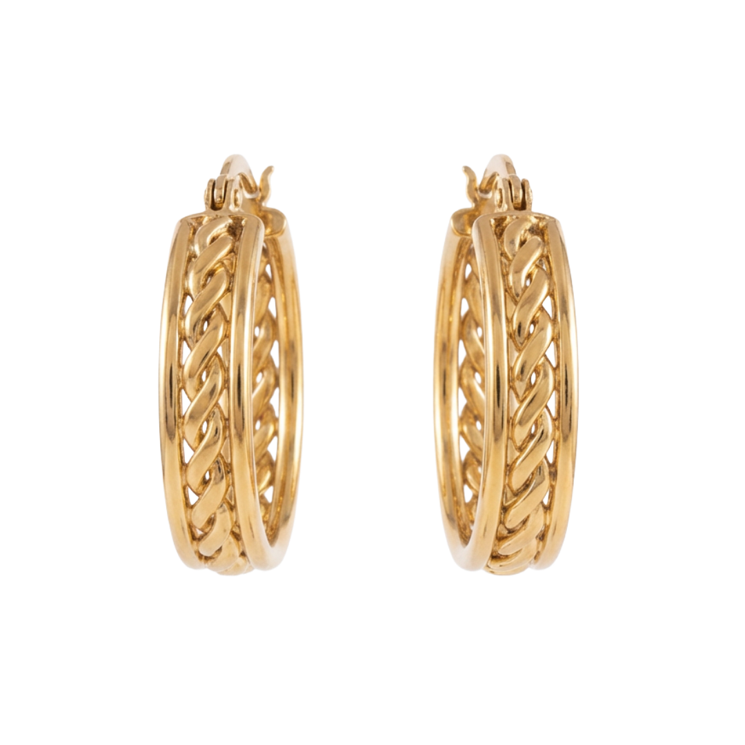 Gold hoop earrings with intricate design on a white background