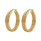 Pair of gold hoop earrings on a white background