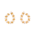 Pair of gold and white hoop earrings on a white background