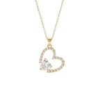 Gold heart-shaped necklace with a clear gemstone on a white background