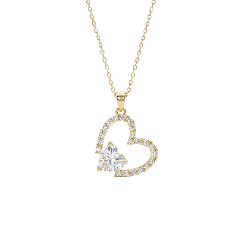 Gold heart-shaped necklace with a clear gemstone on a white background
