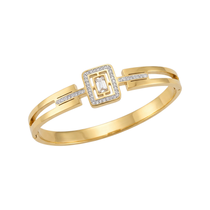 Gold bracelet with diamond accents on a white background