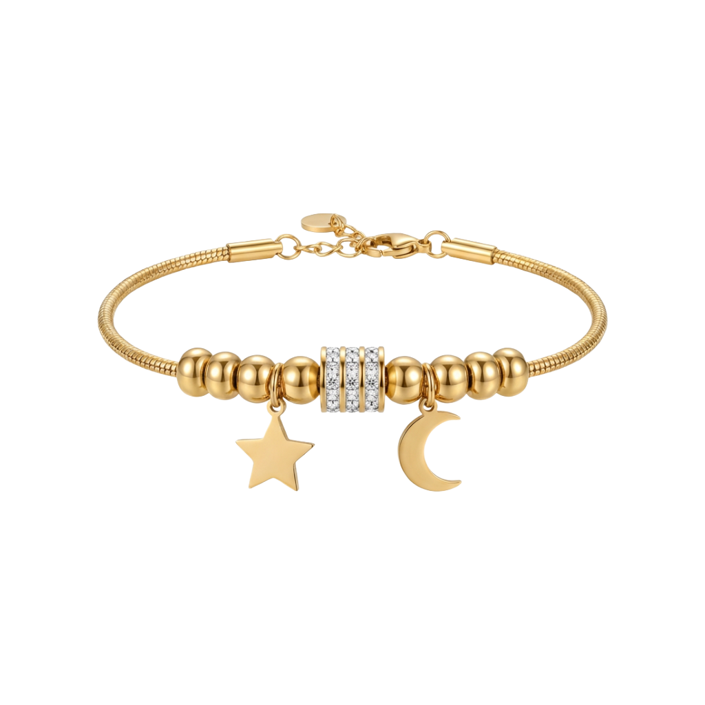 Gold bracelet with star and moon charm on a white background