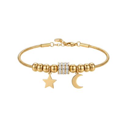 Gold bracelet with star and moon charm on a white background