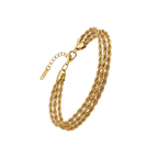 Gold chain bracelet on a white background