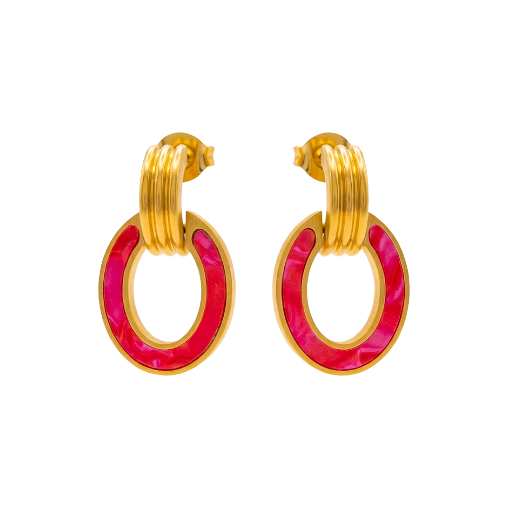 Gold hoop earrings with pink circular accents on a white background