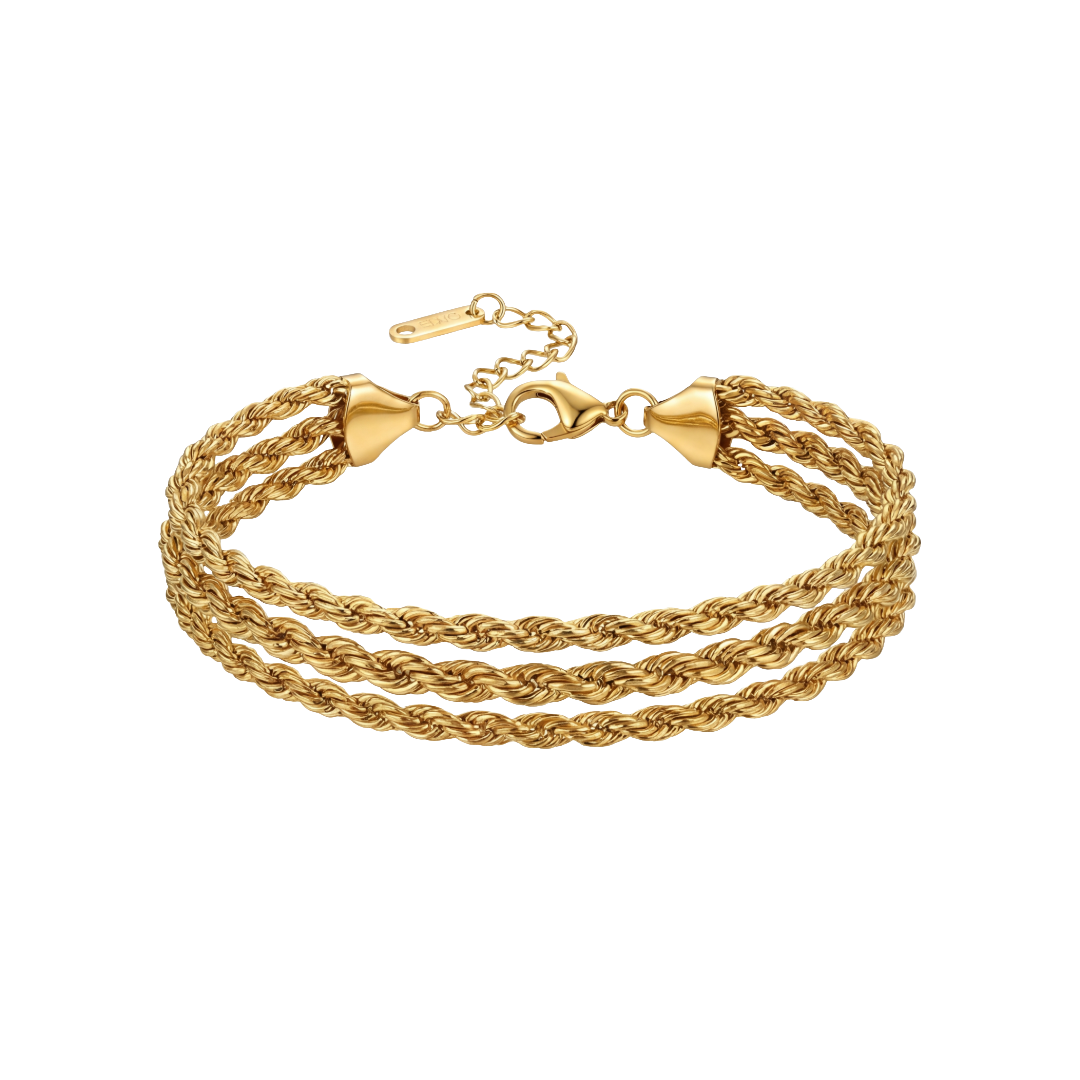 Gold triple-strand bracelet on a white background