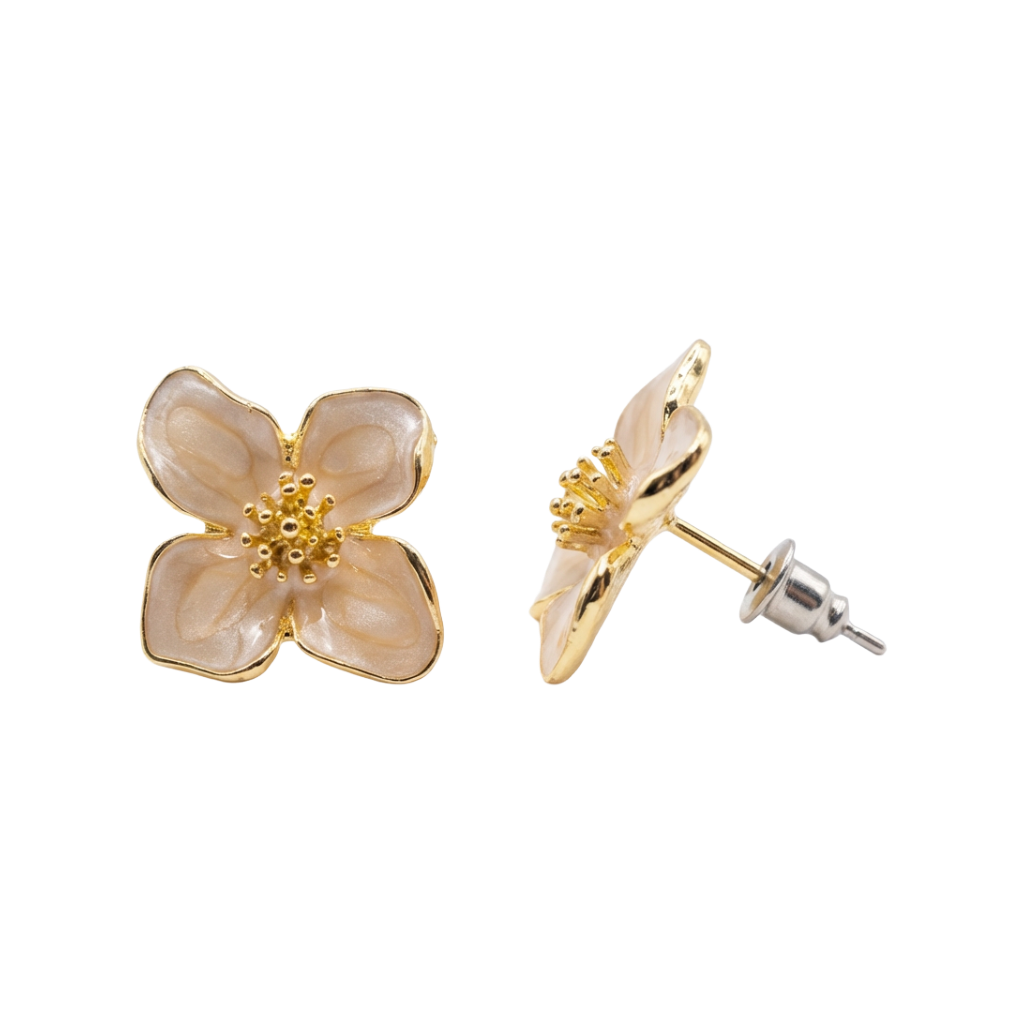 Flower-shaped earrings with gold accents on a white background