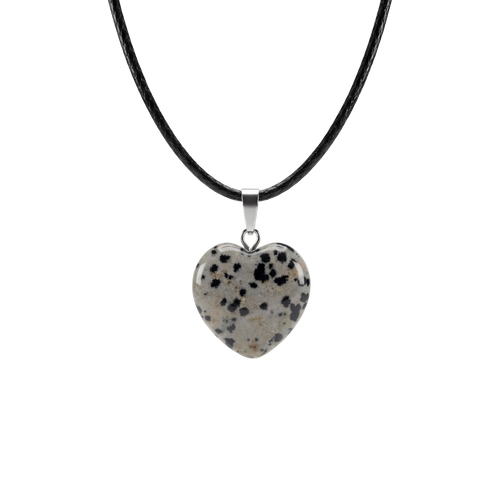 Heart-shaped dalmatian Jasper pendant on a black cord against a white background