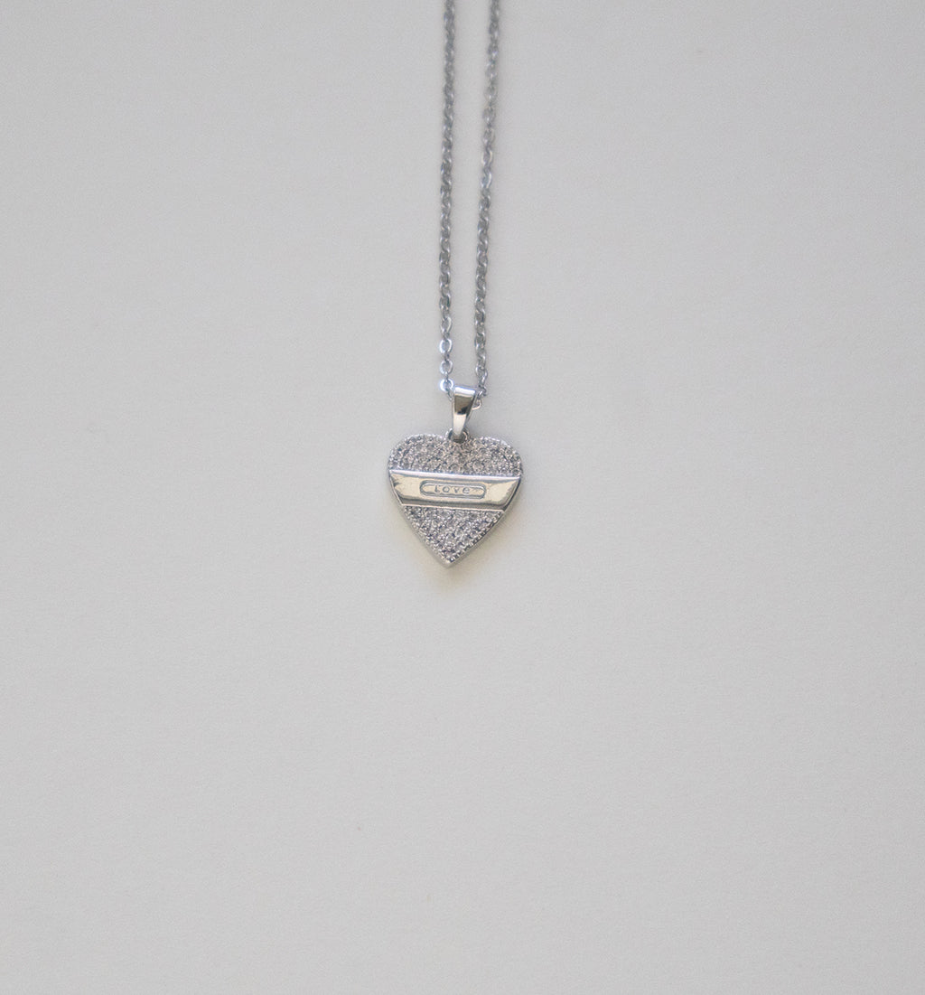Stainless Steel Heart-Shaped Necklace with LOVE Engraving and Crystal Details