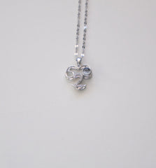 Stainless Steel Silver-Toned Necklace with Number 52 Pendant and Dark Gemstone Accent