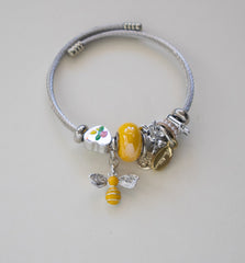 Stainless Steel Bracelet with Decorative Beads and Charms