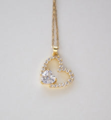 Stainless Steel Heart Pendant Necklace with Crystal Accents and Gold Finish