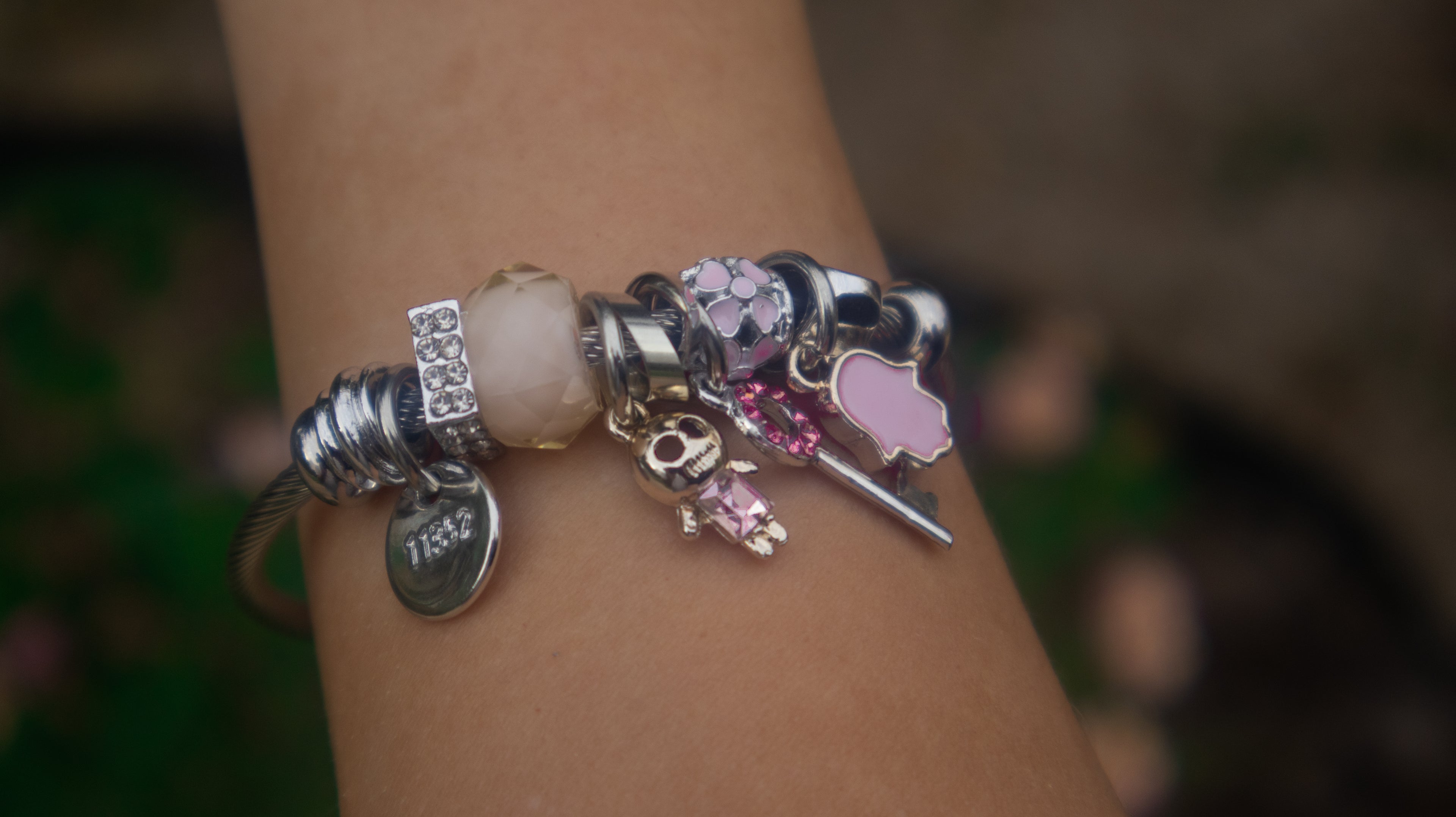 Stainless Steel Pink Accent Beads Charm Bracelet