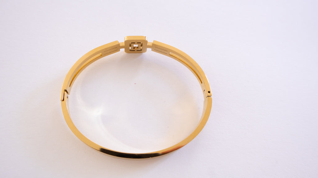 Pulsera de cristal geométrico dorado