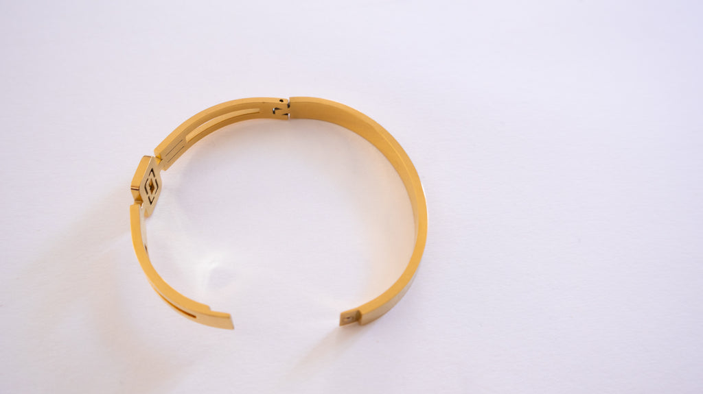 Pulsera de cristal geométrico dorado