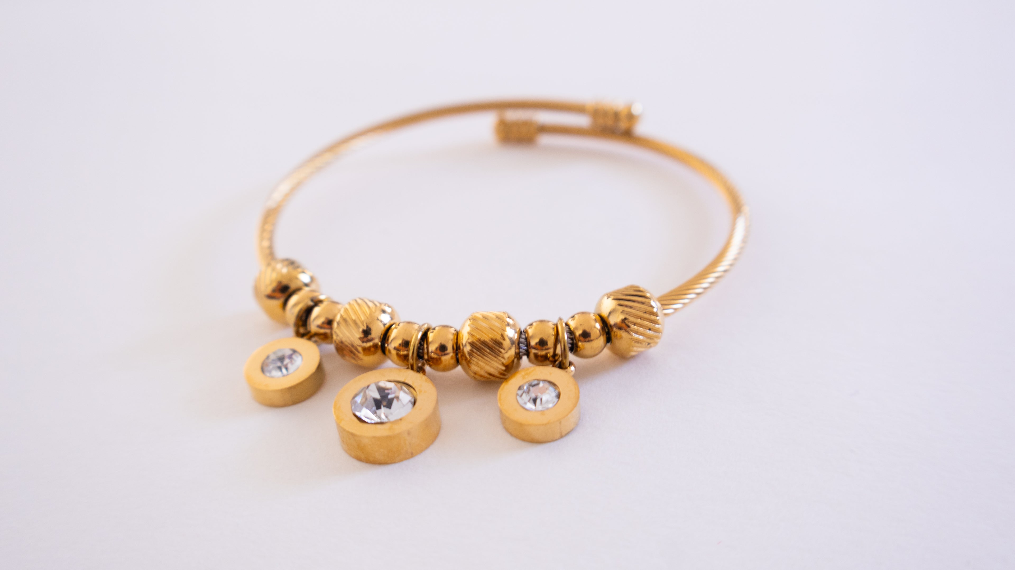 Stainless Steel Gold Cable Bracelet with Three Crystal Charms