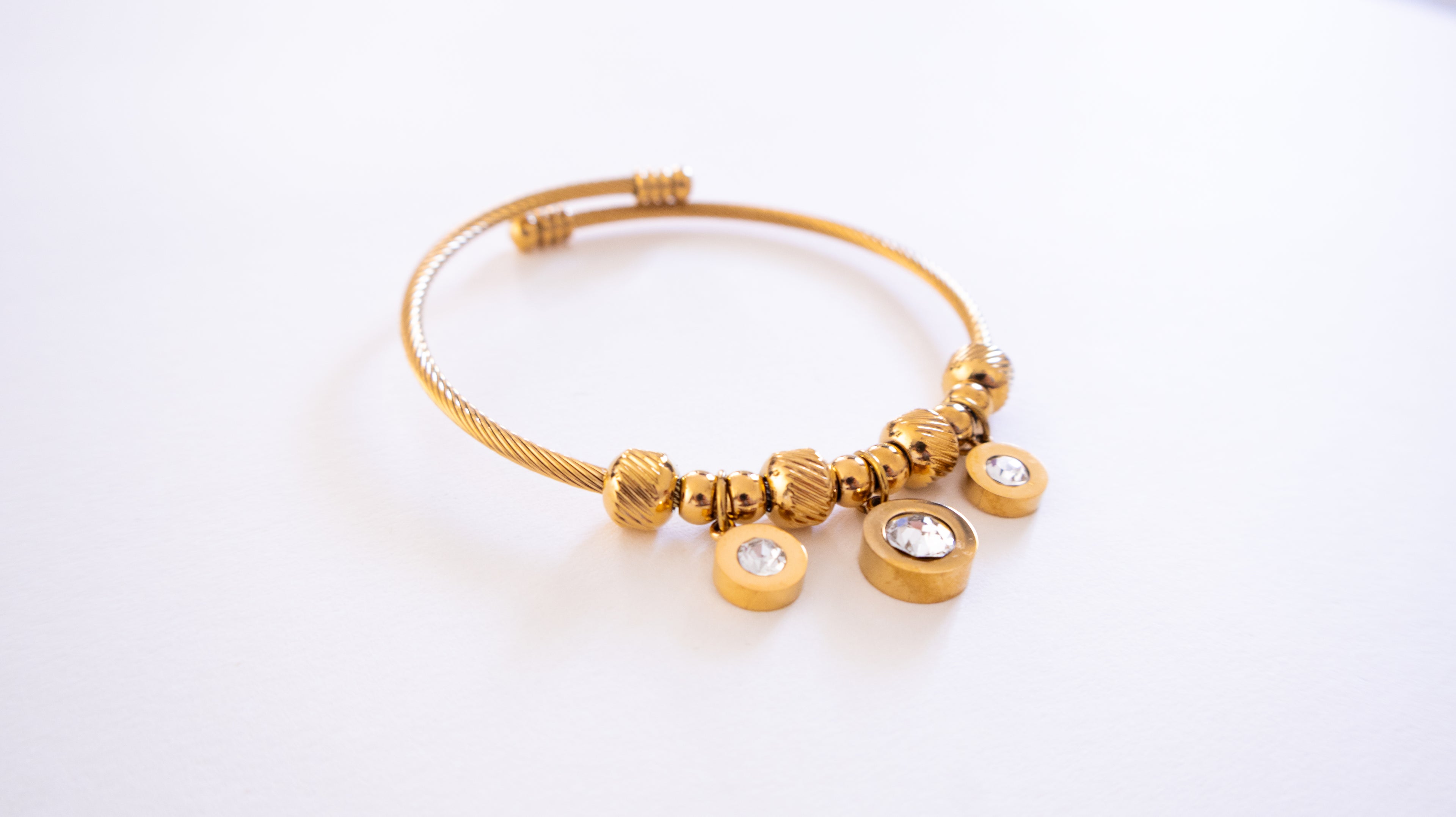 Stainless Steel Gold Cable Bracelet with Three Crystal Charms