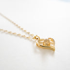 Golden Light-Reactive Stone Heart Necklace