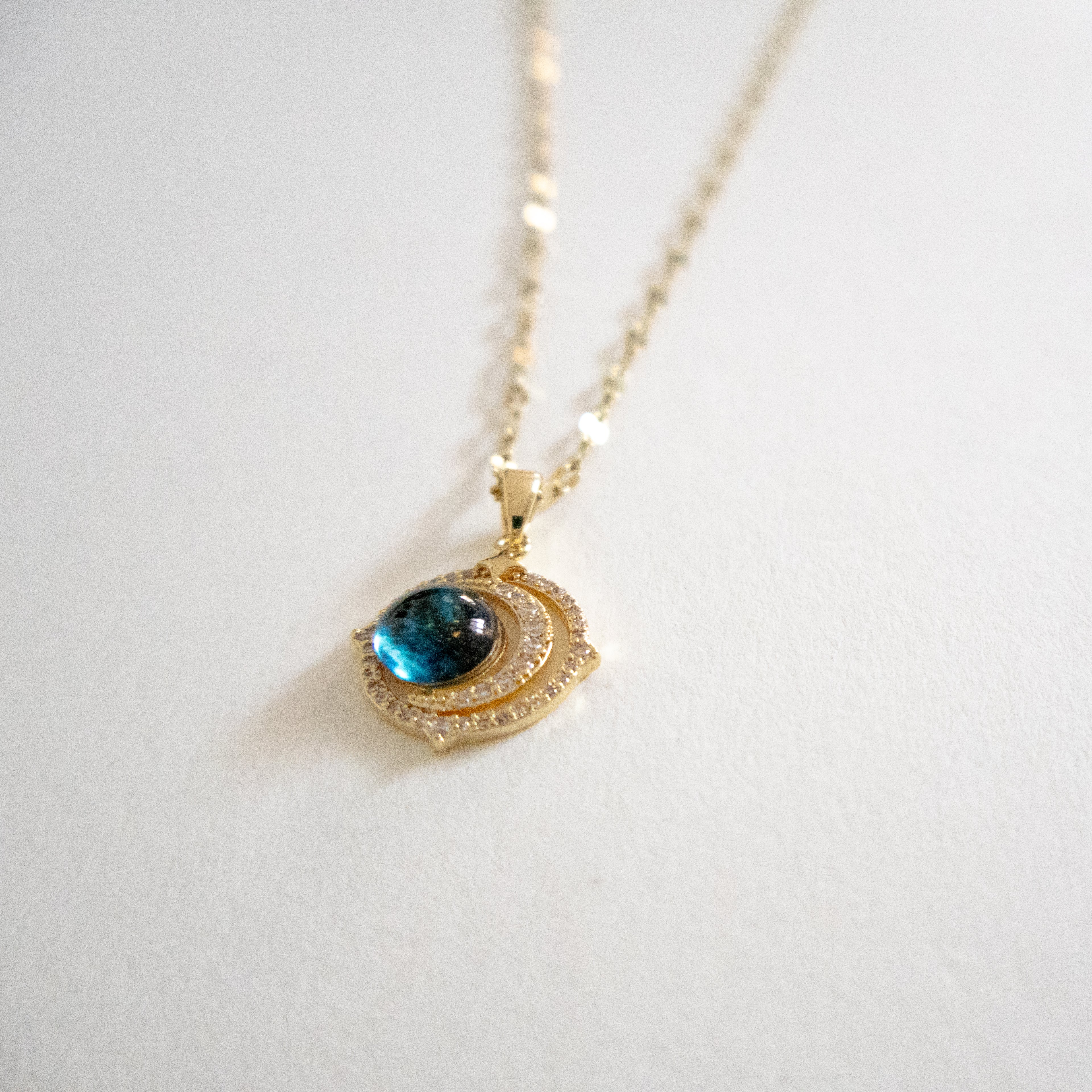 Luminous Blue Orbit Pendant Necklace