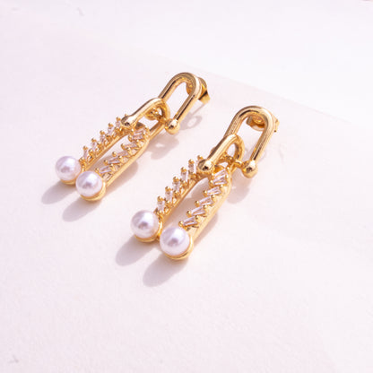 Pendientes de cadena con perlas y dúo