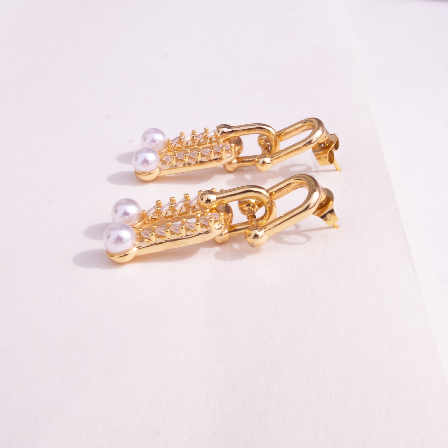 Pendientes de cadena con perlas y dúo