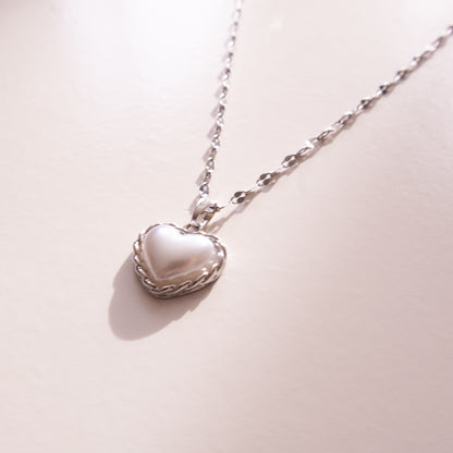 Bound Twisted Silver Heart Pendant Necklace