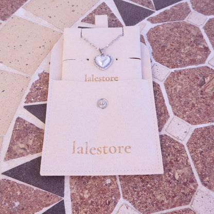 Bound Twisted Silver Heart Pendant Necklace