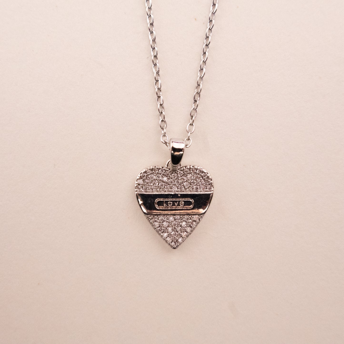 Necklace with a turquoise pendant on a white background