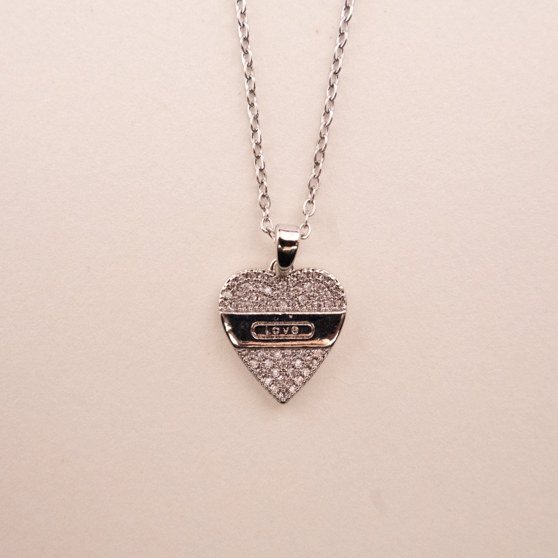 Necklace with a turquoise pendant on a white background