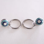 Necklace with a green stone pendant on a white background