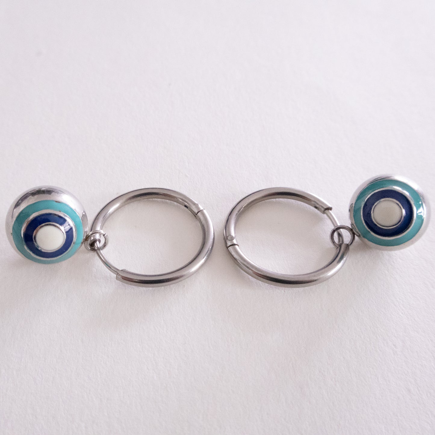 Necklace with a green stone pendant on a white background