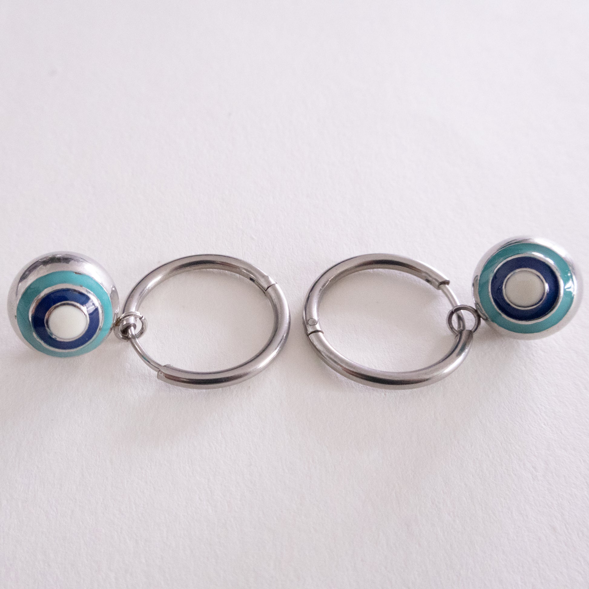 Necklace with a green stone pendant on a white background