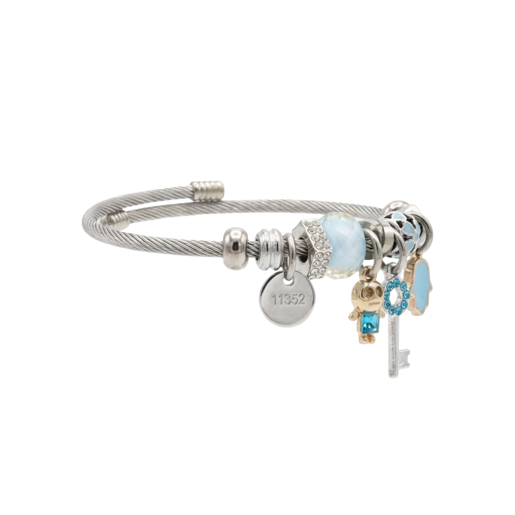 Silver bracelet with charms on a white background
