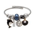 Silver bracelet with various charms including a dolphin, pearl, and shell on a white background